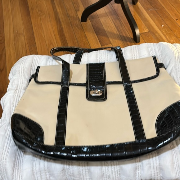 Chadwick's large over the shoulder brown animal trim on beige canvas.Turn lock. - Picture 1 of 4